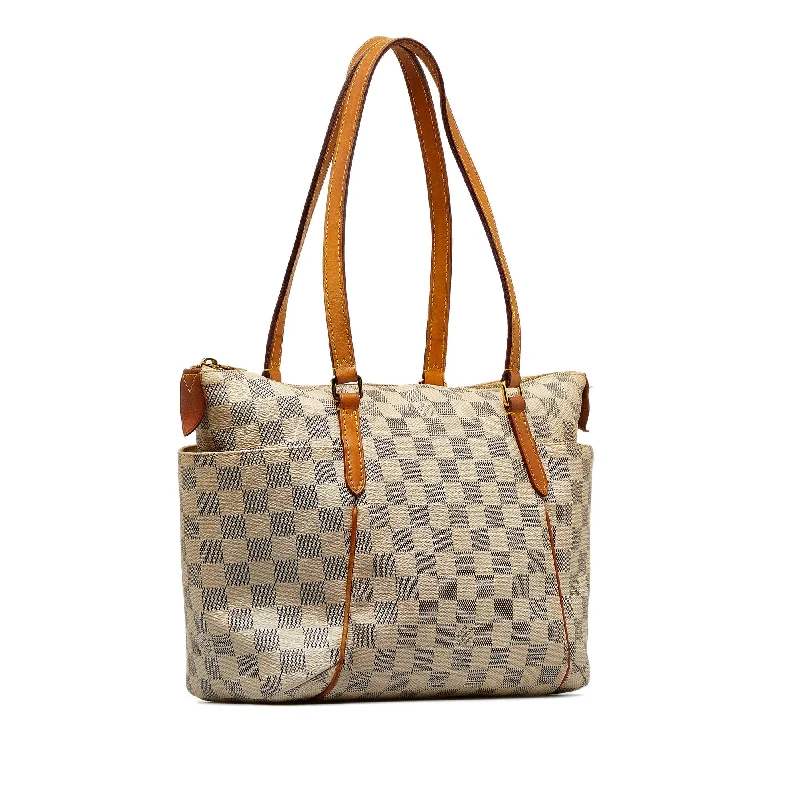 Louis Vuitton crossbody bags with a printed floral pattern for femininityWhite Louis Vuitton Damier Azur Totally MM Tote Bag