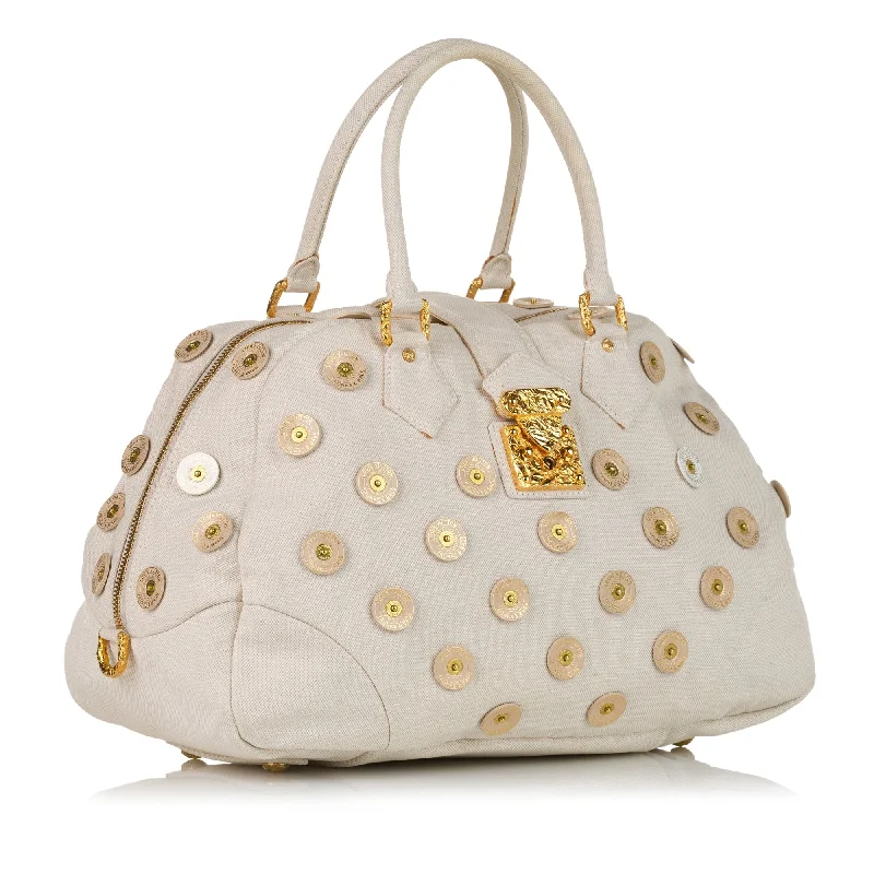 Ladies Louis Vuitton Petite Malle bags in a pastel color for a soft lookWhite Louis Vuitton Polka Dots Panama Bowly Tote Bag