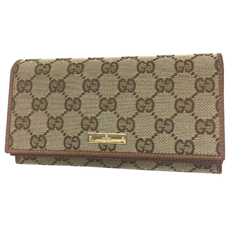 Women Gucci backpacks with a luxurious leather finishGucci GG canvas W flap bifold long wallet 131888 leather beige