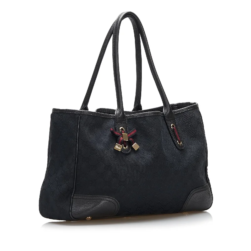 Women Gucci bags with a snap - button closure and a decorative charmGucci GG Canvas Princy Tote (SHG-1bUst1)