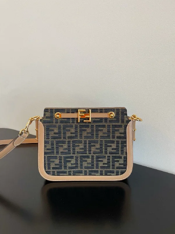 Ladies Fendi Peekaboo bags with a detachable shoulder strap for different carrying optionsFendi Touch Brown FF Fabric Bag