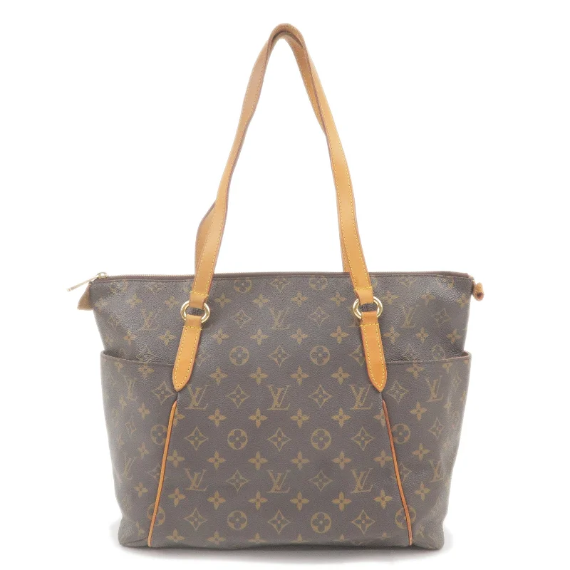 Louis Vuitton Twist bags with a contrast - colored interior for visual interestLouis Vuitton Monogram Totally MM Tote Bag M56689