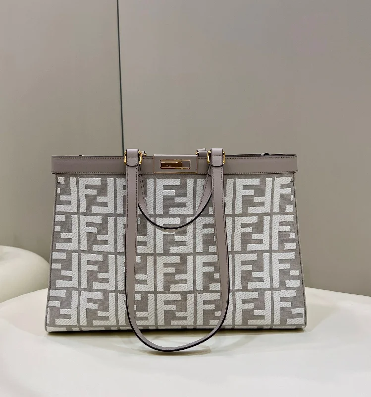 Fendi bags with a Bluetooth - enabled key finder for never losing keys againFendi X-Tote White canvas FF bag