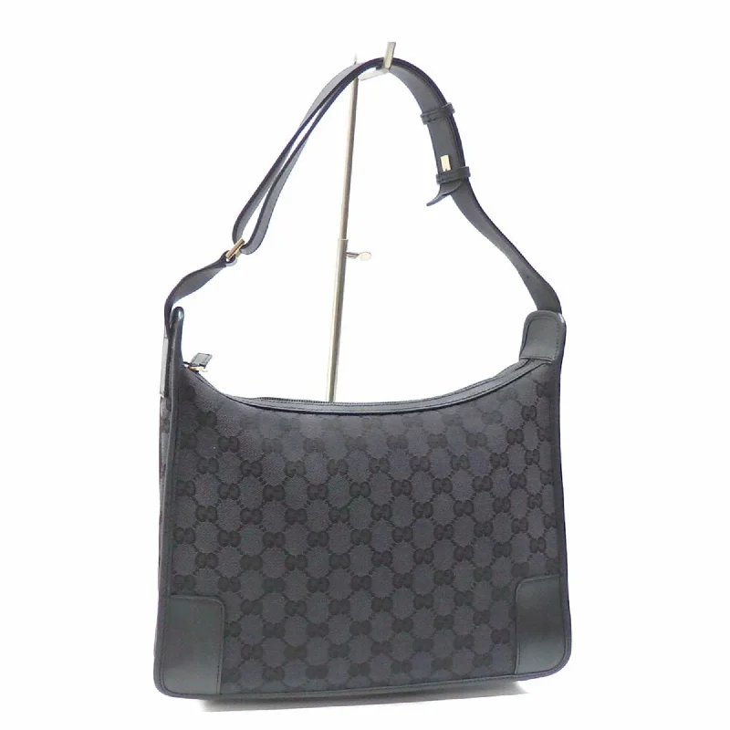 Women Gucci bags with a magnetic snap closure for easy accessGucci shoulder bag ladies black GG canvas leather 001 4205 001998