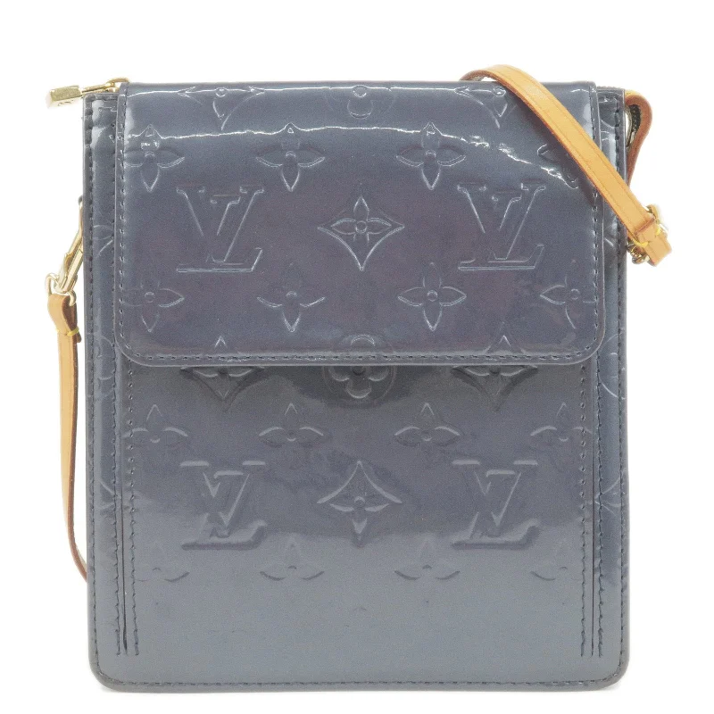 Louis Vuitton bags with a snap - button closure and a decorative charm for styleLouis Vuitton Monogram Vernis Mott Shoulder Bag Indigo M91338