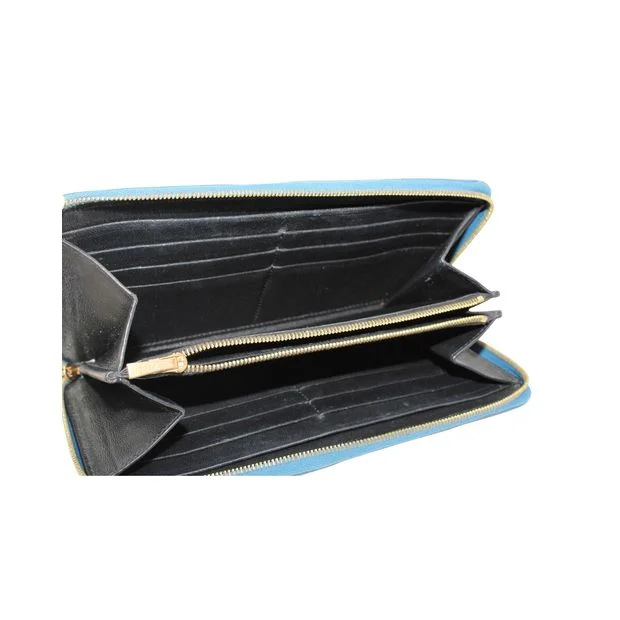 Best bags for business tripsCeline Blue Python Leather Wallet