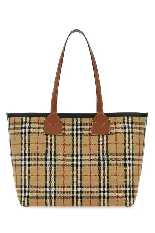 Burberry Bags with Antique - Style HardwareBurberry Woman Embroidered Canvas Medium London Shopping Bag