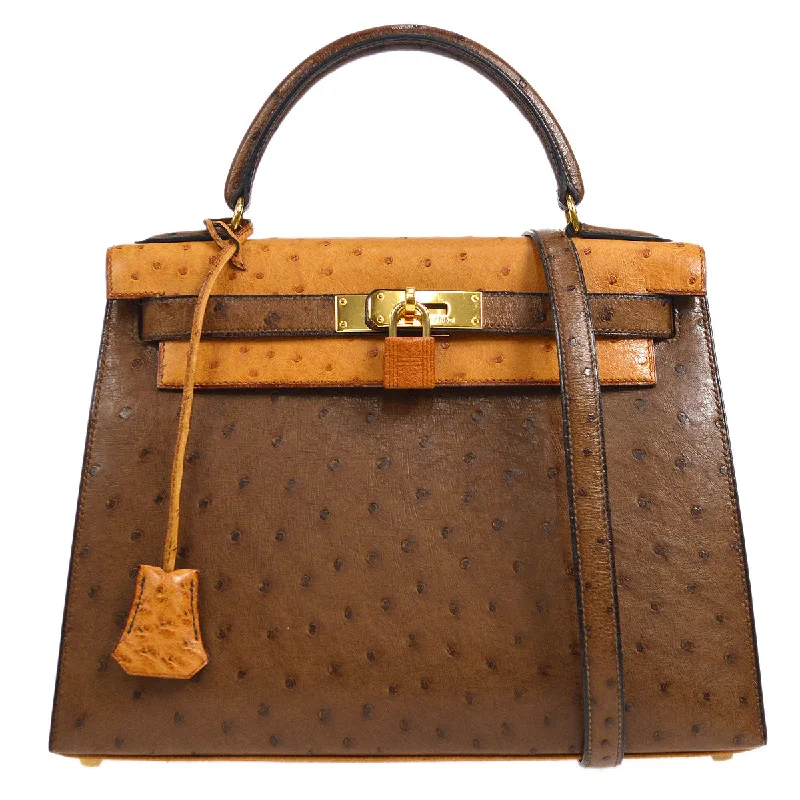 Hermès Kelly Bags in a rare shade of royal purple for a statementHERMES * 1994 KELLY 28 SELLIER Fauve Chestnut Ostrich