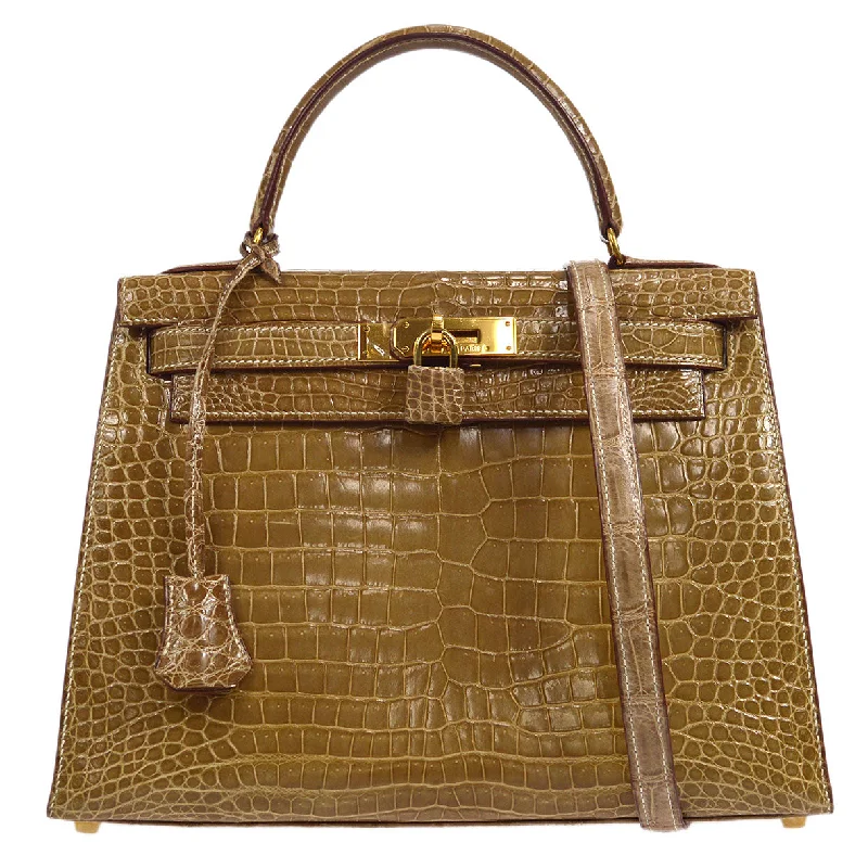 Hermès Kelly Bags with a hand - burnished edge finish for a vintage charmHERMES * 1997 KELLY 28 SELLIER Ficelle Porosus