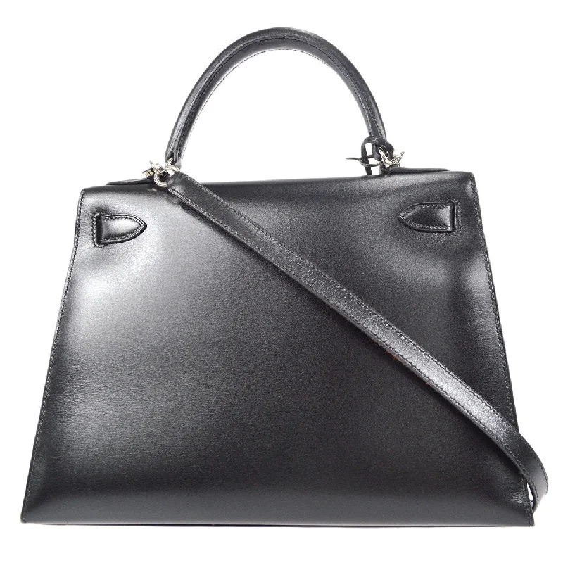 Hermès Kelly Bags with a contrast - colored interior liningHERMES * 2003 KELLY GUILLOCHE 28 SELLIER Black Box Calf