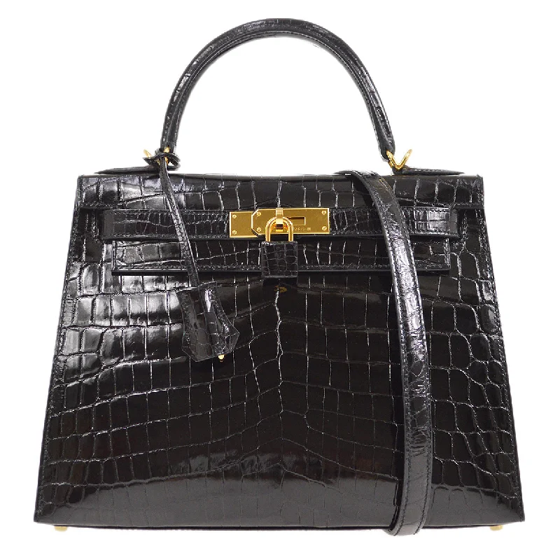 Hermès Kelly Bags with a monogram - embossed leather panelHERMES * 2019 KELLY 28 SELLIER Niloticus Black