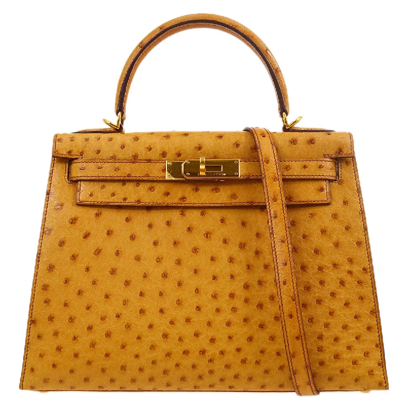 Hermès Kelly Bags with a hand - stitched leather handle for artisanal charmHERMES * 2005 KELLY 28 SELLIER Chestnut