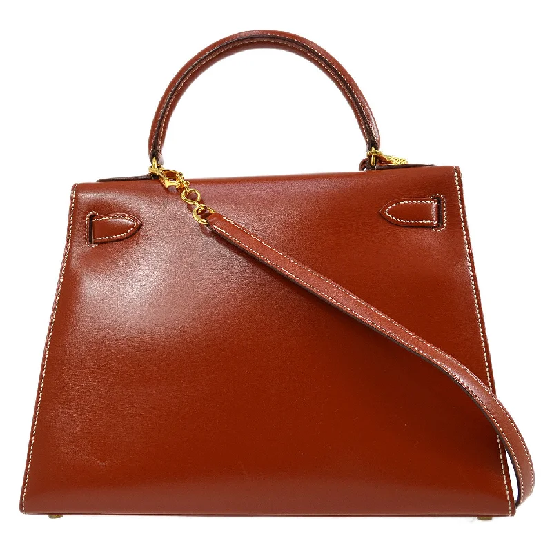 Hermès Kelly Bags with a single - handle design for simplicityHERMES 1990 KELLY 28 SELLIER Brique Box calf