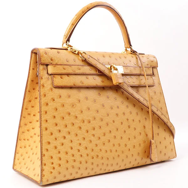 Hermès Kelly Bags with a chain - embellished handle for a modern twistHermes 1993 Made Ostrich Kelly Bag 32Cm Chestnut