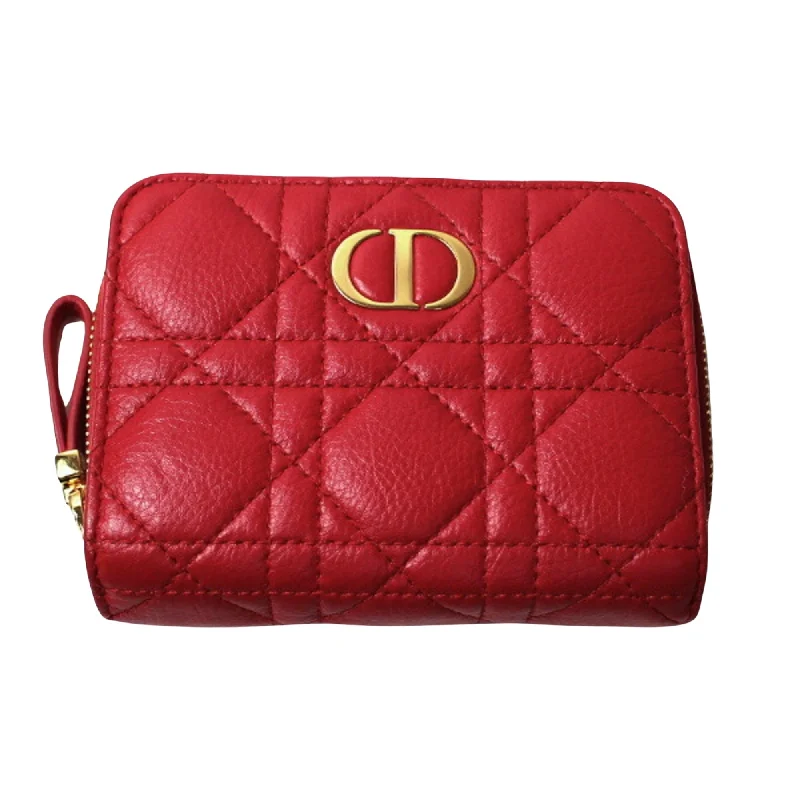 Christian Dior handbags with a snap - button closure and a decorative buckleDior CARO Wallet